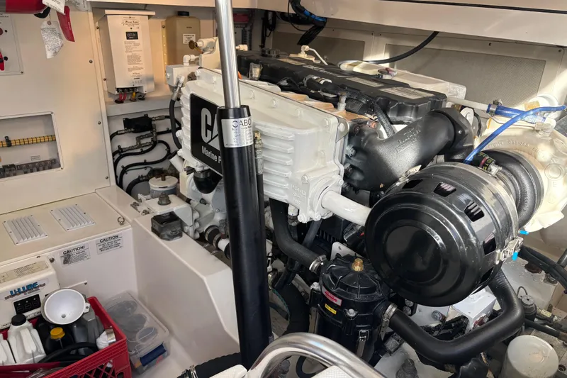  Yacht Photos Pics Engine room of a 2010 Cabo 36 Express boat, featuring a CAT Marine Power engine.