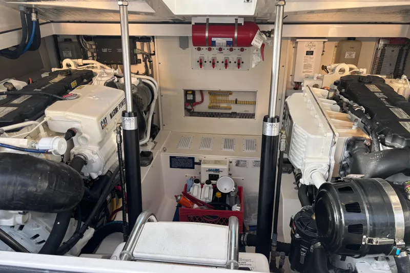  Yacht Photos Pics Engine room of a 2010 Cabo 36 Express boat with dual marine engines.