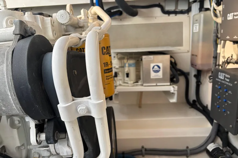  Yacht Photos Pics Engine room of 2010 Cabo 36 Express with CAT components and wiring.