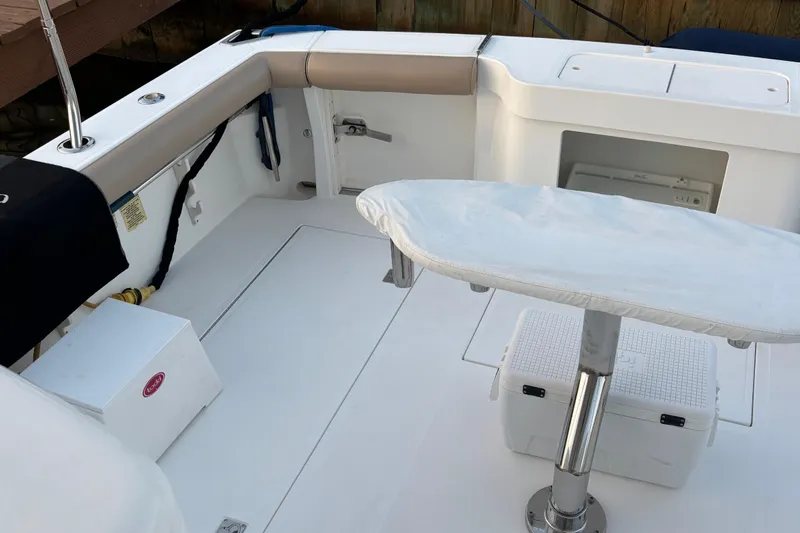  Yacht Photos Pics 2010 Cabo 36 Express boat interior with seating and table setup.