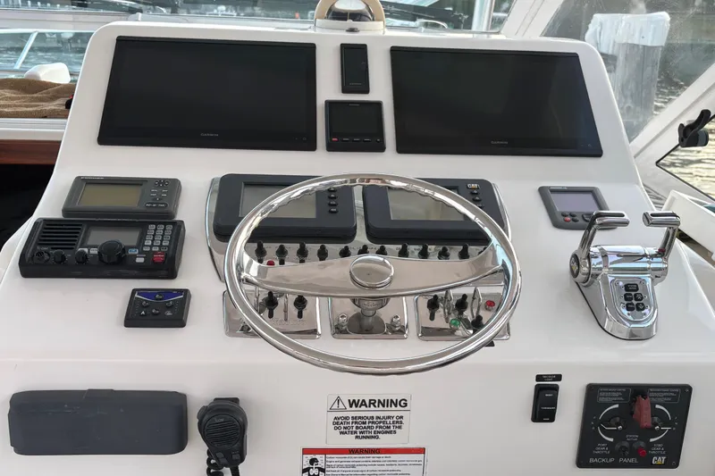  Yacht Photos Pics Helm of 2010 Cabo 36 Express boat with navigation and control systems.