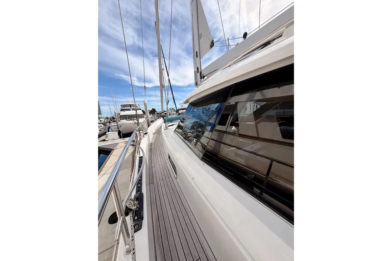 Cross Wind Yacht Photos Pics 2016 Moody Decksaloon 54 yacht docked, showcasing sleek design and polished deck.