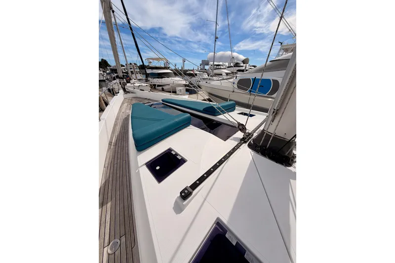 Cross Wind Yacht Photos Pics Sailing yacht Moody Decksaloon 54, 2016 model, docked with blue cushions on deck.