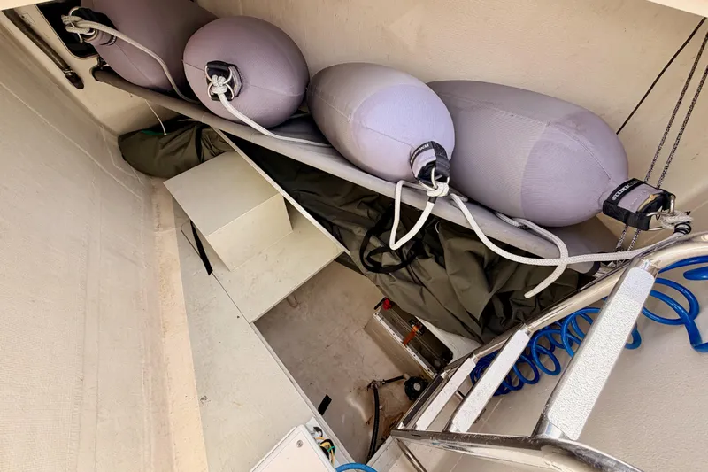 Cross Wind Yacht Photos Pics Storage compartment of 2016 Moody Decksaloon 54 yacht with fenders and equipment.
