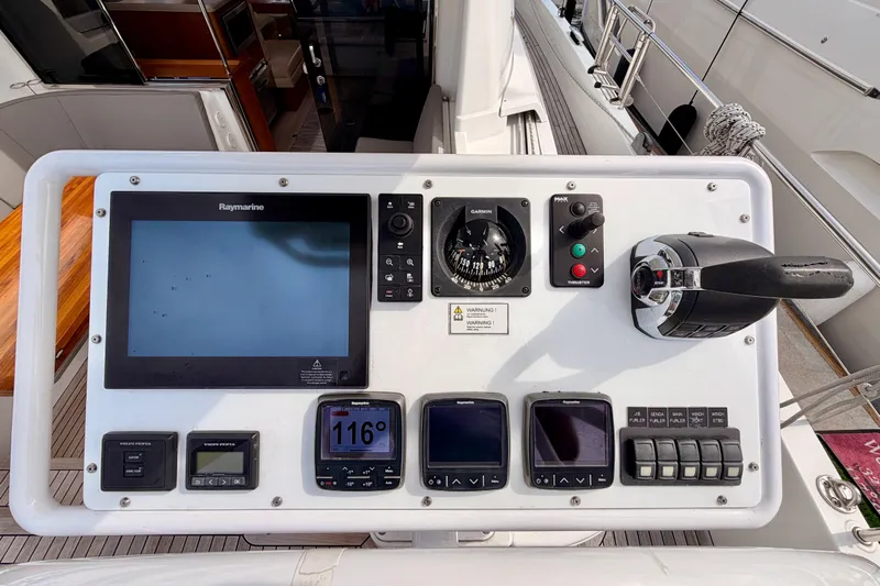 Cross Wind Yacht Photos Pics Control panel of a 2016 Moody Decksaloon 54 yacht with navigation instruments.
