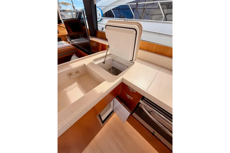 Cross Wind Yacht Photos Pics Luxurious kitchen area in 2016 Moody Decksaloon 54 yacht with modern amenities.