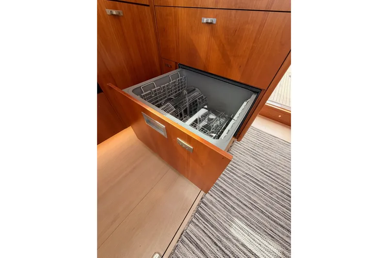 Cross Wind Yacht Photos Pics Built-in dishwasher in 2016 Moody Decksaloon 54 yacht kitchen.