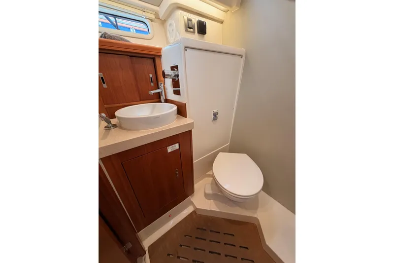 Cross Wind Yacht Photos Pics 2016 Moody Decksaloon 54 yacht bathroom with modern sink and toilet.
