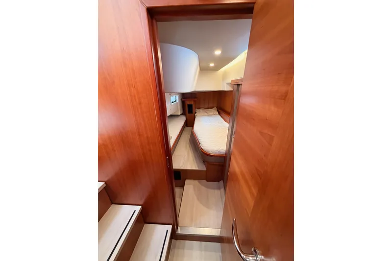 Cross Wind Yacht Photos Pics Cozy cabin interior of 2016 Moody Decksaloon 54 yacht with wooden finish.