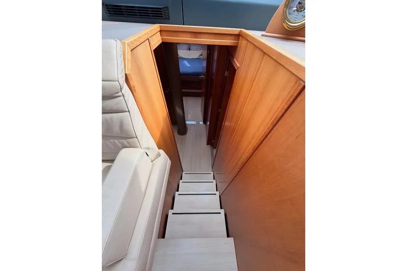 Cross Wind Yacht Photos Pics Staircase leading to cabin interior of 2016 Moody Decksaloon 54 yacht.