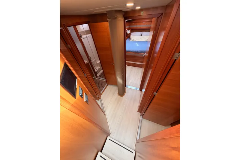 Cross Wind Yacht Photos Pics Luxurious interior of 2016 Moody Decksaloon 54 yacht with wood finish and cozy cabin.