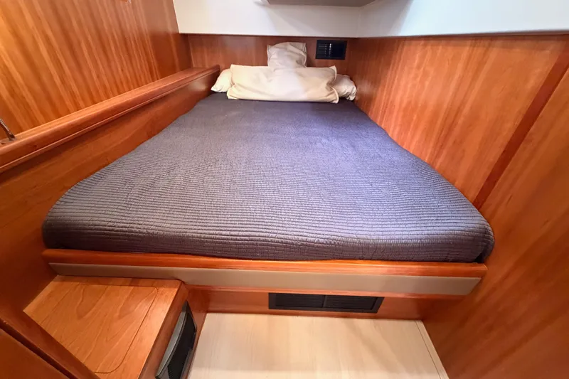 Cross Wind Yacht Photos Pics Cozy cabin bed in 2016 Moody Decksaloon 54 yacht with wooden interior.