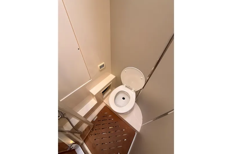 Cross Wind Yacht Photos Pics 2016 Moody Decksaloon 54 yacht bathroom with toilet and wooden floor.