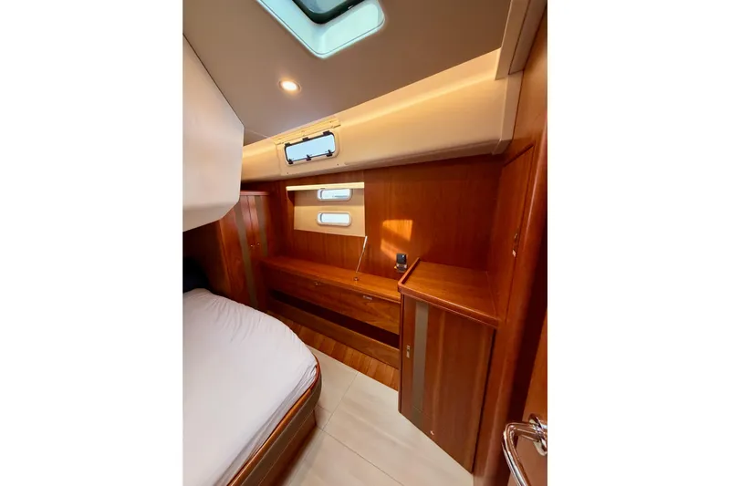 Cross Wind Yacht Photos Pics Luxurious wooden interior of 2016 Moody Decksaloon 54 yacht cabin.