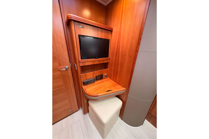 Cross Wind Yacht Photos Pics Luxurious Moody Decksaloon 54 yacht interior with TV and wooden desk, 2016 model.