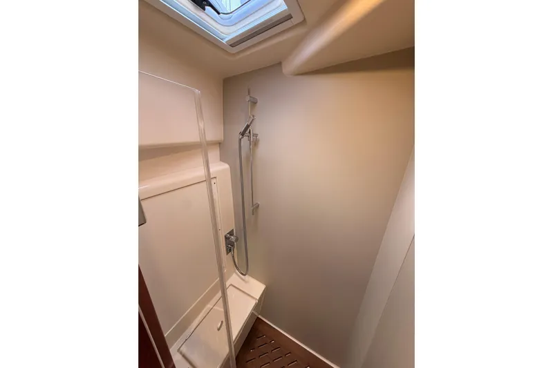 Cross Wind Yacht Photos Pics Shower area in 2016 Moody Decksaloon 54 yacht with skylight and modern fixtures.