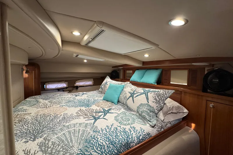Vita Nova Yacht Photos Pics Luxurious cabin interior of 2018 Aspen C120 with elegant bedding and ambient lighting.
