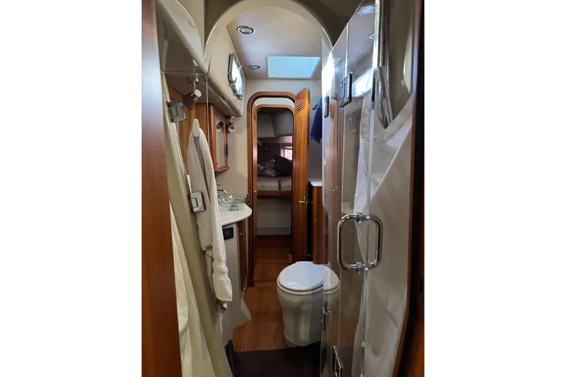 Vita Nova Yacht Photos Pics Luxurious Aspen C120 2018 yacht bathroom with wood accents and modern fixtures.