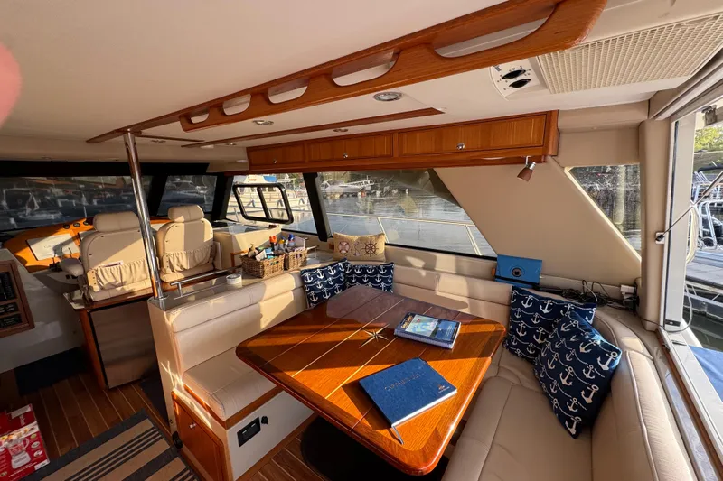 Vita Nova Yacht Photos Pics Luxurious interior of 2018 Aspen C120 yacht with elegant seating and nautical decor.