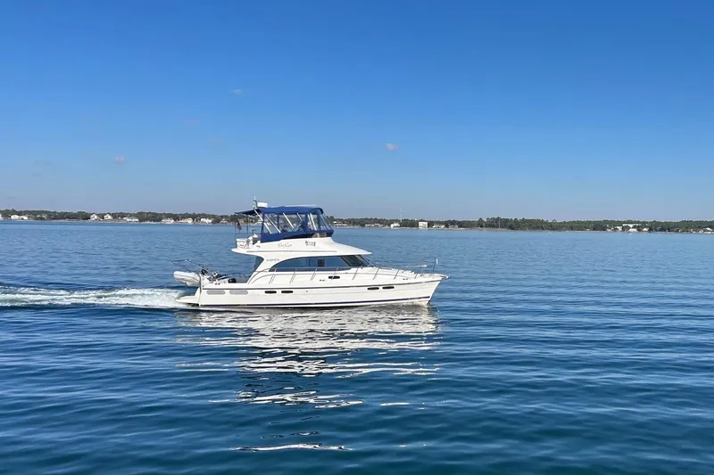 Vita Nova Yacht Photos Pics 2018 Aspen C120 boat cruising on calm blue waters under clear sky.