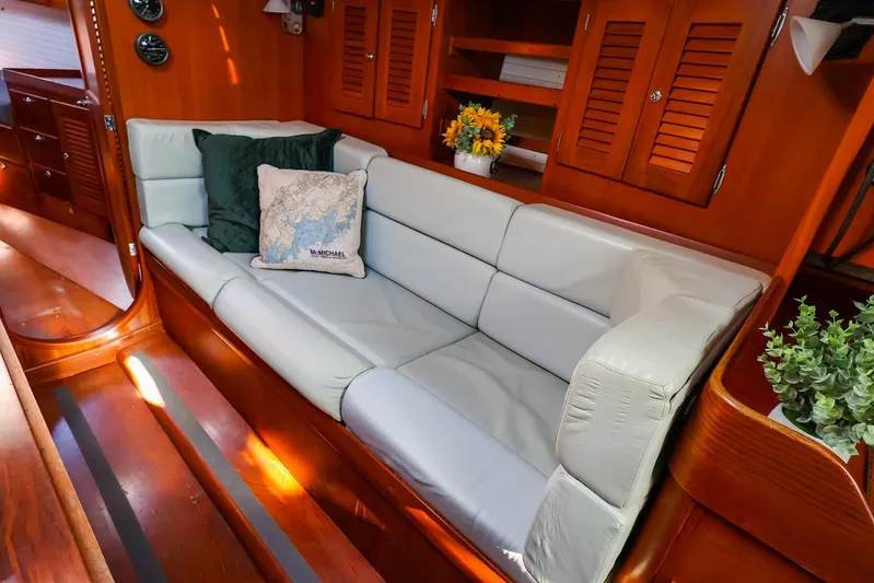 Mojo Yacht Photos Pics Luxurious interior of 2004 J Boats J/46 yacht with elegant seating and decor.