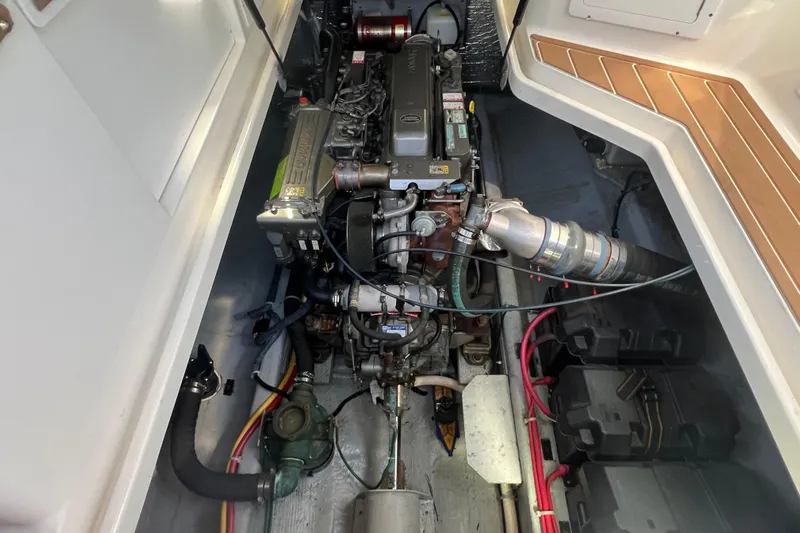 Indigo Yacht Photos Pics Engine compartment of a 2005 Back Cove 29 boat, showcasing detailed mechanical components.