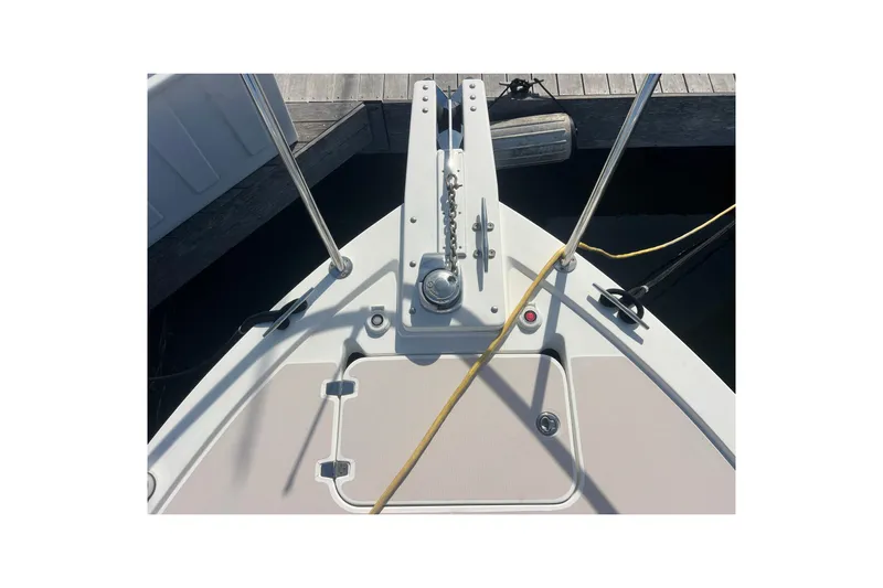 Indigo Yacht Photos Pics Bow of 2005 Back Cove 29 boat with anchor and dock lines.