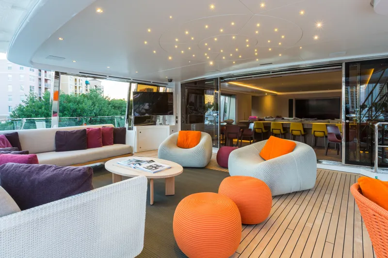 Mr. D Yacht Photos Pics Luxurious 2015 Benetti 140 yacht interior with modern seating and ambient lighting.