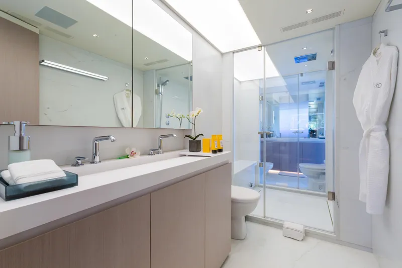 Mr. D Yacht Photos Pics Luxurious bathroom on 2015 Benetti 140 yacht, featuring modern fixtures and elegant design.