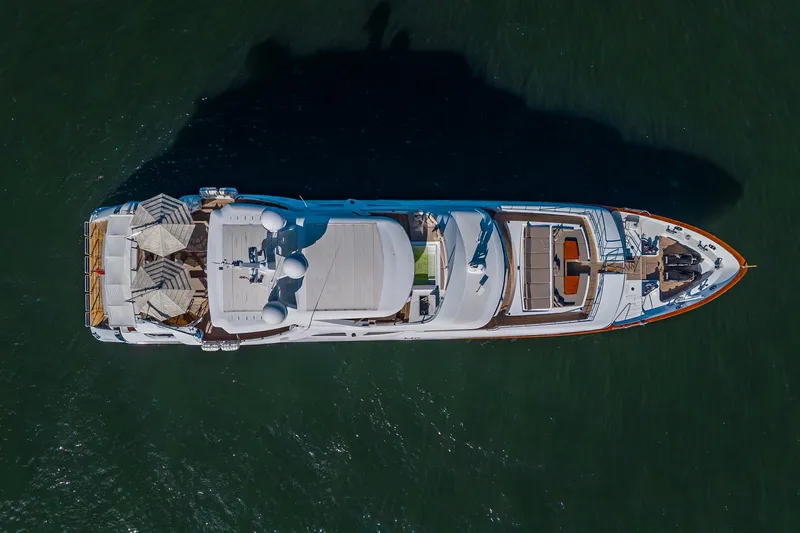 Mr. D Yacht Photos Pics Aerial view of 2015 Benetti 140 yacht on open water.