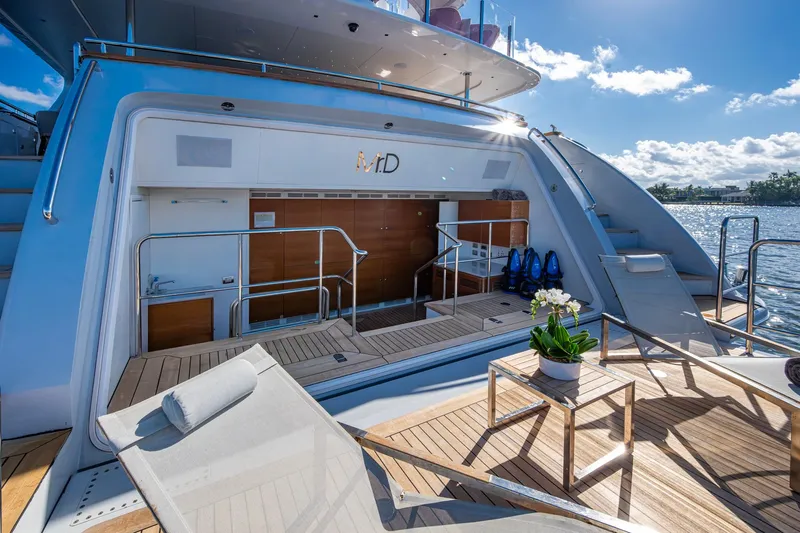 Mr. D Yacht Photos Pics Luxurious 2015 Benetti 140 yacht deck with sun loungers and scenic ocean view.