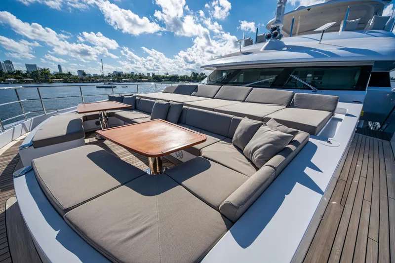 Mr. D Yacht Photos Pics Luxurious 2015 Benetti 140 yacht with spacious sun deck and elegant seating area.