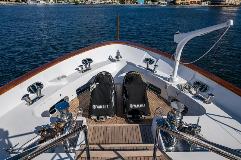 Mr. D Yacht Photos Pics Luxurious 2015 Benetti 140 yacht deck with Yamaha equipment, overlooking serene waters.