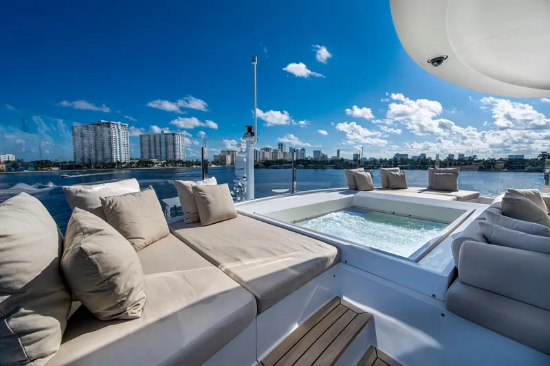 Mr. D Yacht Photos Pics Luxurious 2015 Benetti 140 yacht with sun deck jacuzzi and city skyline view.