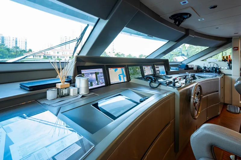 Mr. D Yacht Photos Pics Luxurious 2015 Benetti 140 yacht helm with modern navigation equipment and panoramic windows.