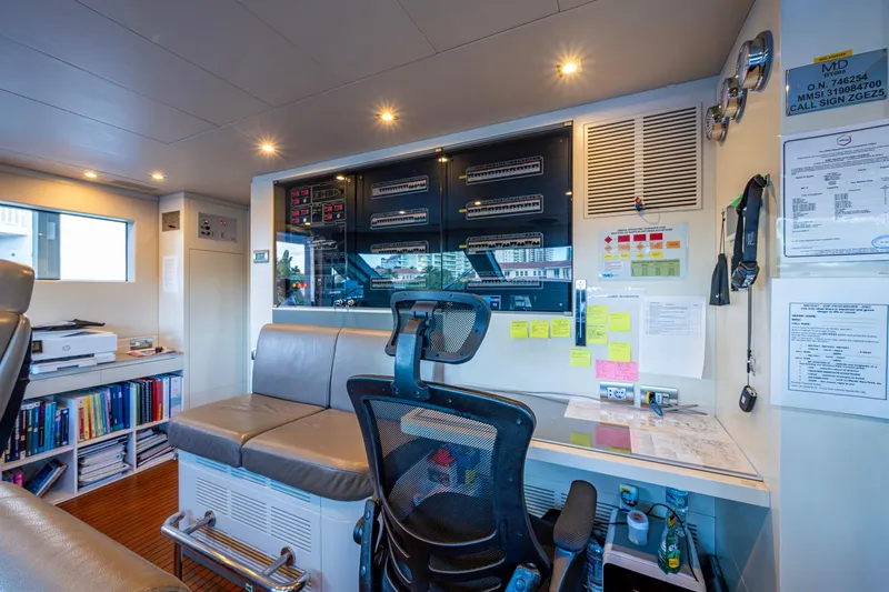 Mr. D Yacht Photos Pics Control room of a 2015 Benetti 140 yacht with modern equipment and seating.