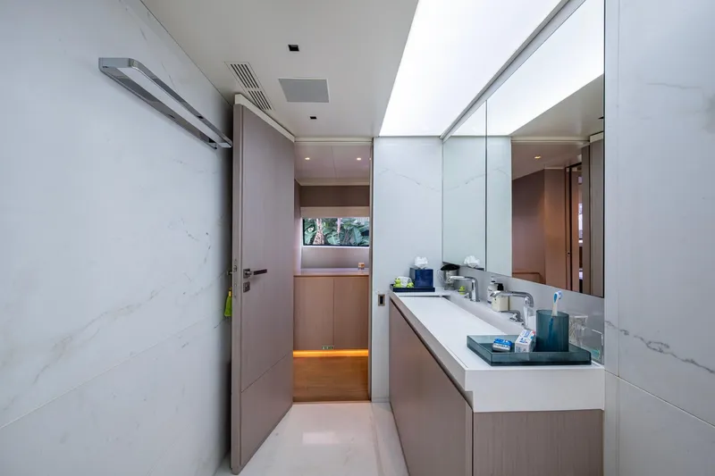 Mr. D Yacht Photos Pics Luxurious bathroom interior on a 2015 Benetti 140 yacht, featuring modern design and amenities.