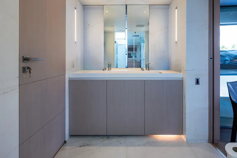 Mr. D Yacht Photos Pics Modern bathroom interior on 2015 Benetti 140 yacht, featuring sleek design and elegant fixtures.