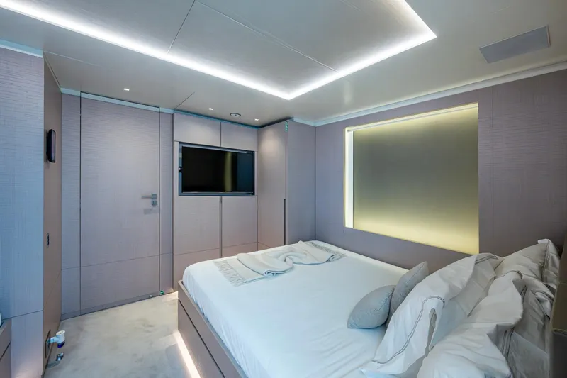 Mr. D Yacht Photos Pics Luxurious bedroom interior on 2015 Benetti 140 yacht with modern design and ambient lighting.