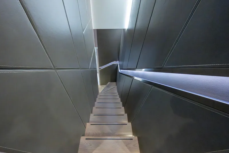 Mr. D Yacht Photos Pics Modern staircase with sleek design on a 2015 Benetti 140 yacht.