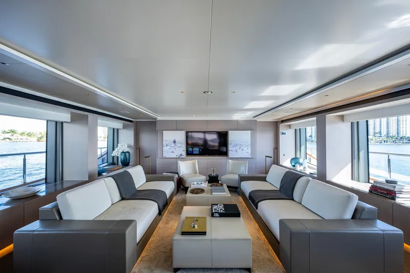 Mr. D Yacht Photos Pics Luxurious interior of 2015 Benetti 140 yacht with modern sofas and panoramic windows.