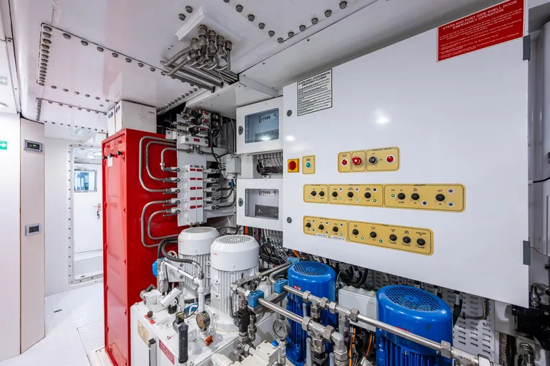 Mr. D Yacht Photos Pics Engine room of 2015 Benetti 140 yacht with control panels and machinery.