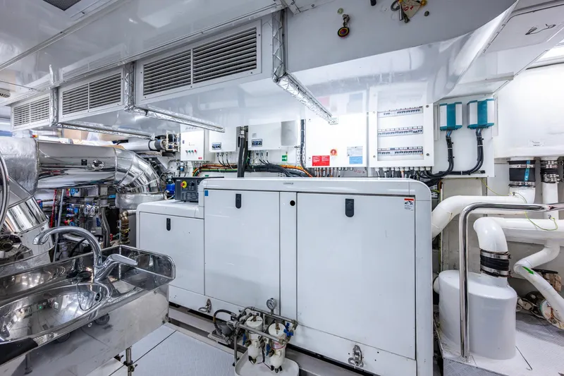 Mr. D Yacht Photos Pics Engine room of a 2015 Benetti 140 yacht, featuring advanced machinery and equipment.