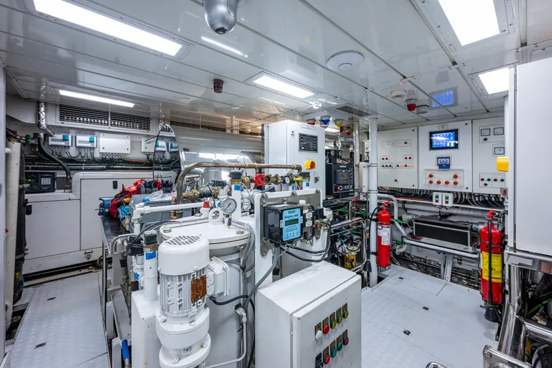 Mr. D Yacht Photos Pics Engine room of 2015 Benetti 140 yacht, featuring advanced machinery and control panels.