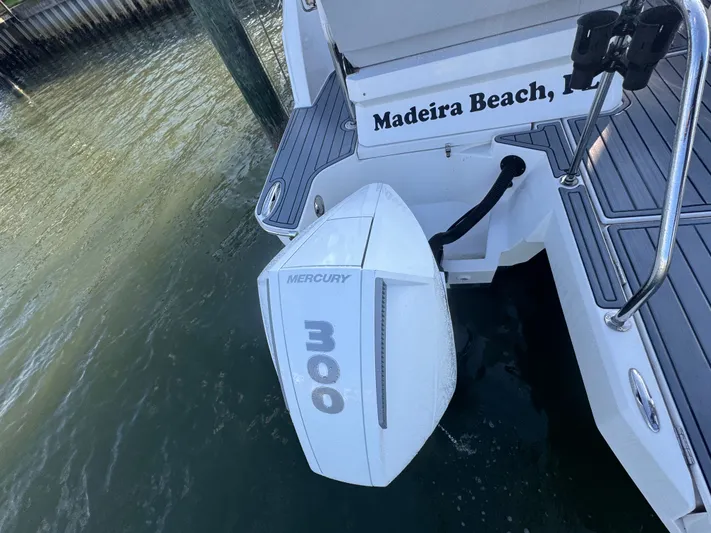  Yacht Photos Pics Aquila 32 Sport 2023 boat with Mercury 300 engine at Madeira Beach dock.