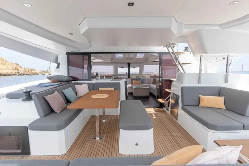  Yacht Photos Pics Luxurious 2025 Fountaine Pajot Elba 45 yacht interior with spacious seating and elegant design.