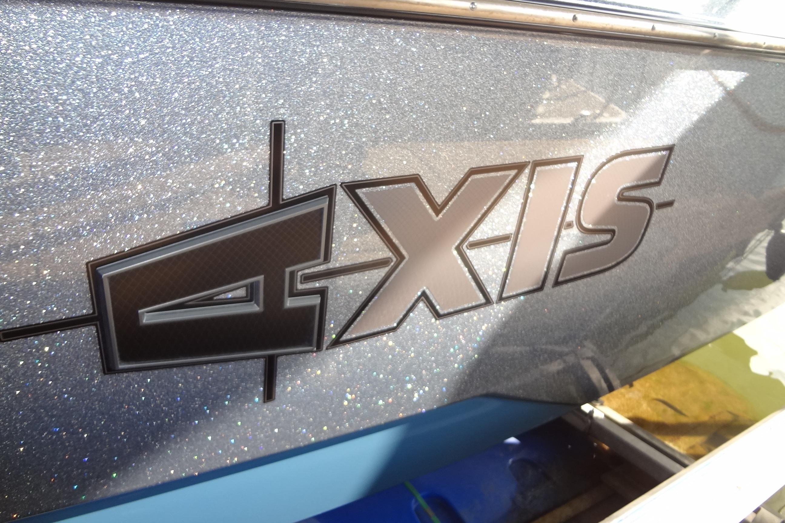 2021 Axis A24 boat logo on a sparkling metallic surface.