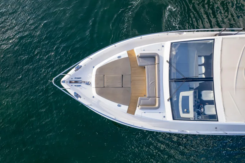  Yacht Photos Pics Aerial view of 2020 Pearl 80 yacht on calm water.
