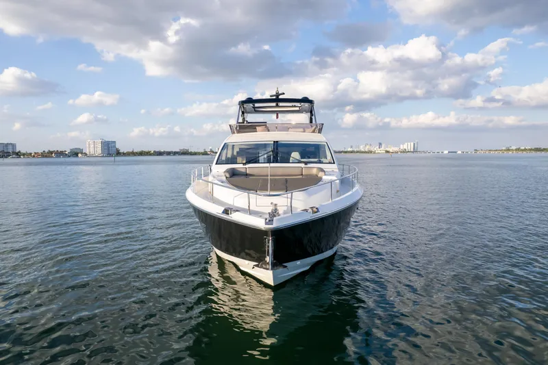  Yacht Photos Pics Luxurious Pearl 80 yacht on calm waters under a partly cloudy sky, 2020 model.