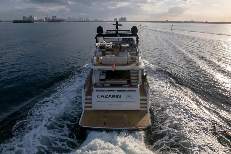  Yacht Photos Pics Luxurious Pearl 80 yacht cruising on open water at sunset, 2020 model.